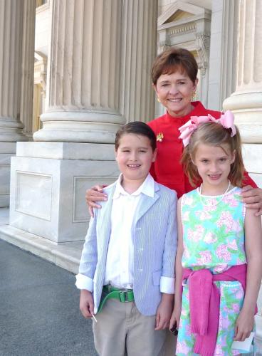 Caroline and Daniel on the steps of the US Capitol with Congresswoman Sue Myrick, R-NC