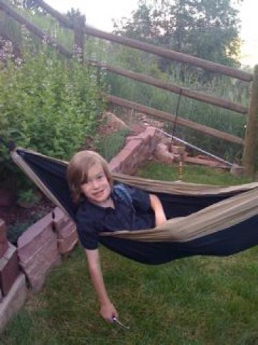 Klaus just kicking it in Dad's hammock on Fathers Day.