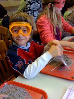 12/7/09--looking for fossils on a field trip to the CU Museum of Science and History.  He found a shark tooth!