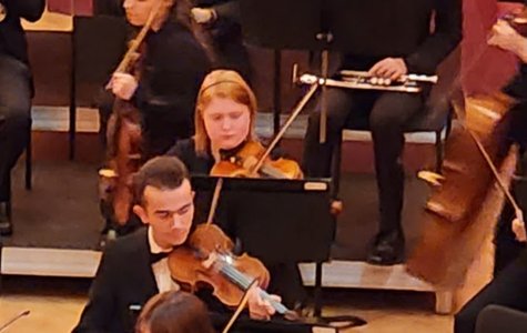 A&#x20;bit&#x20;blurry,&#x20;but&#x20;I&#x20;tried&#x20;to&#x20;crop&#x20;people&#x20;out,,,here&#x27;s&#x20;Keegan&#x20;&#x28;and&#x20;friend&#x3B;&#x29;&#x20;playing&#x20;with&#x20;the&#x20;Madison&#x20;Symphony.&#x20;&#x20;He&#x20;has&#x20;monthly&#x20;concerts.