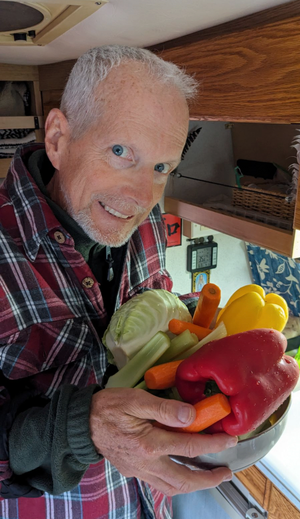 Bob&#x20;prepping&#x20;his&#x20;veggies&#x20;in&#x20;the&#x20;van&#x20;in&#x20;Baja.