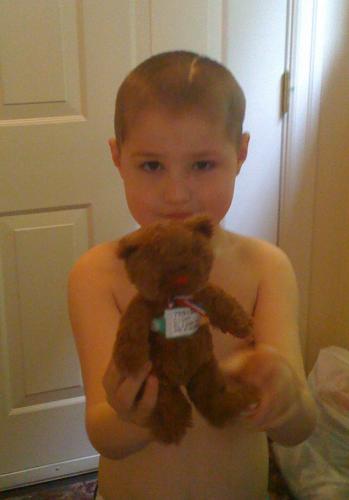 The bear from our exciting day at the hospital, 5-8-09 (complete with hospital ID bracelet)