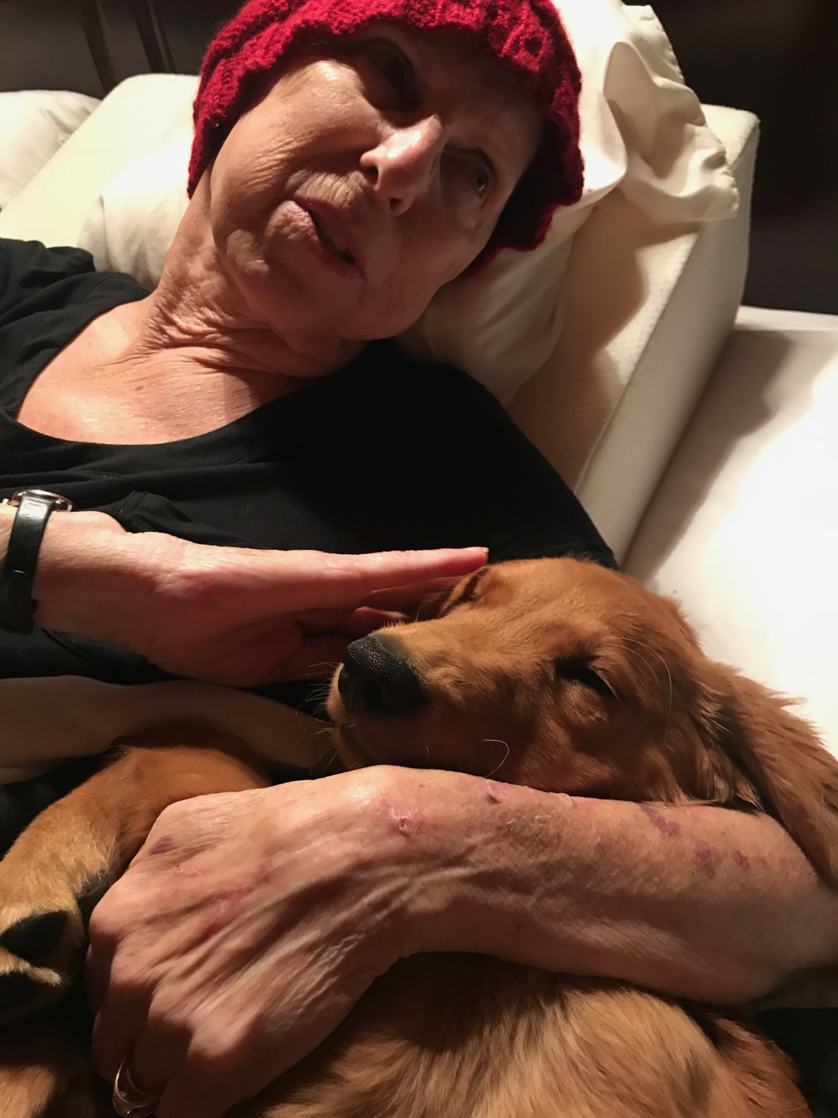 Redgie says good night to mom every night and gets snuggles.