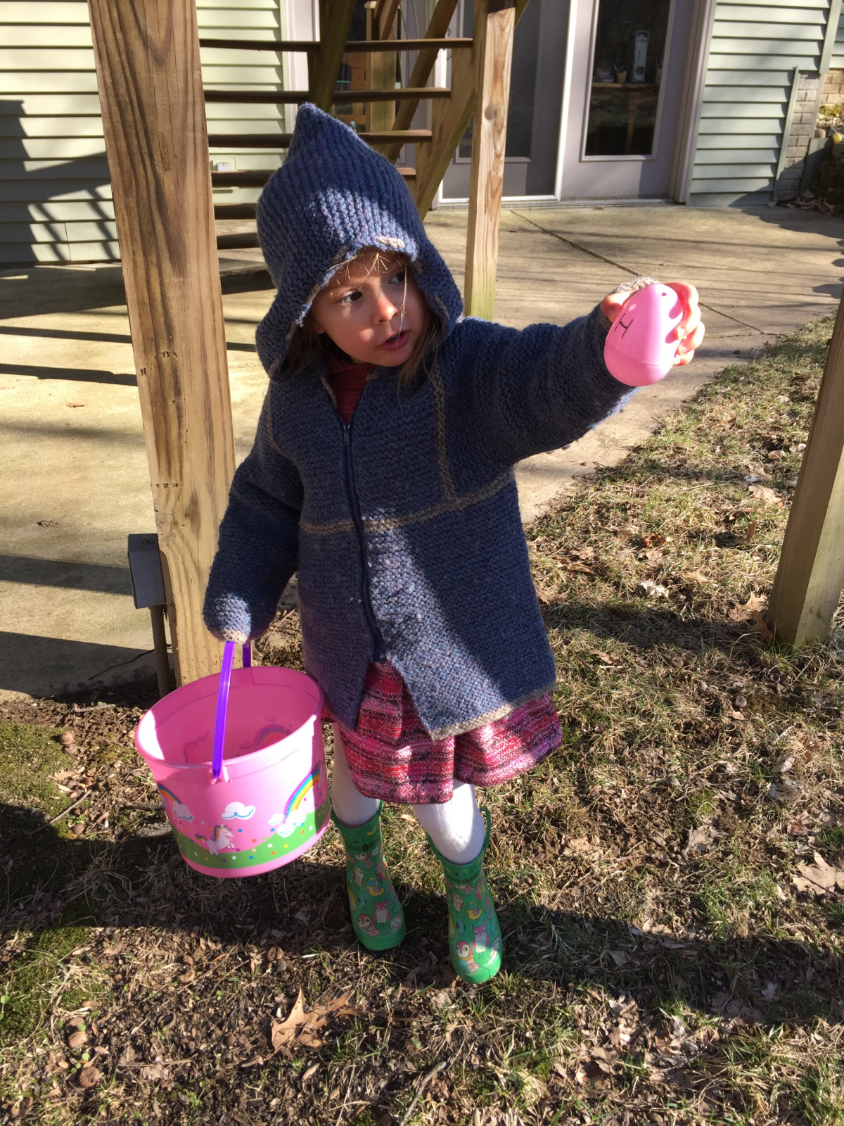 It was a chilly early Easter Egg hunt. Helene is wearing an Elizabeth Zimmermann Tomten Jacket that I knitted for our eldest son 40 years ago. 