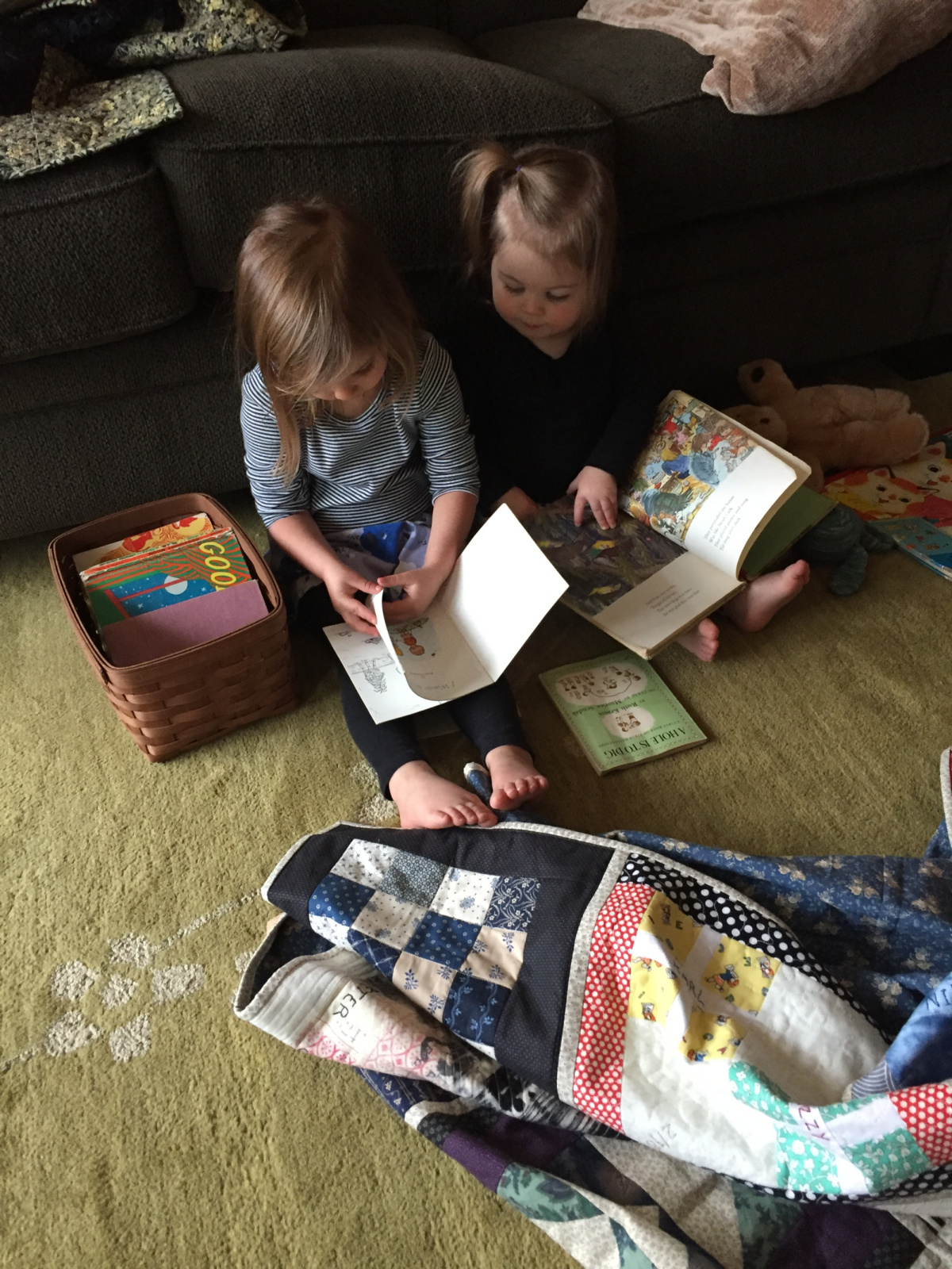 Getting in some last minute reading. These girls love the quilts and the books.