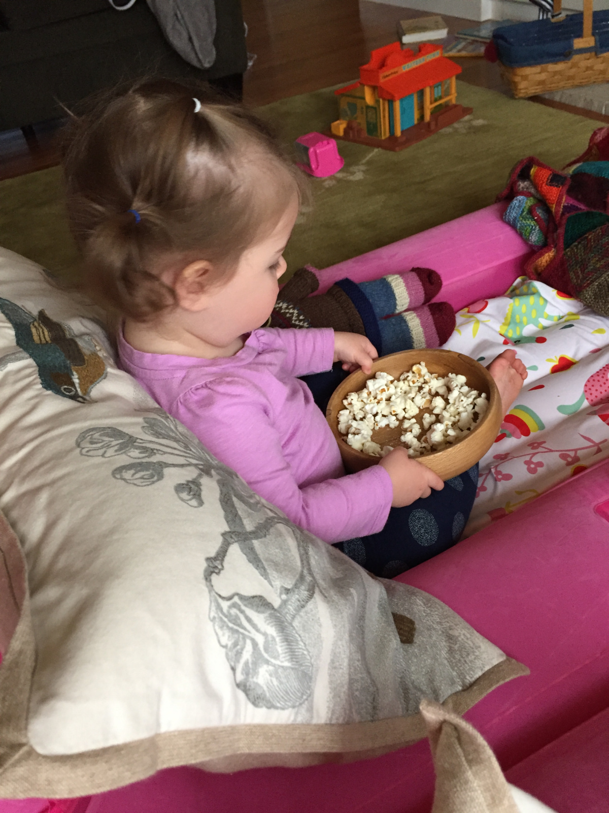 Movie and Popcorn for Maeve. She didn't last too long with the movie but made her own fun anyway.