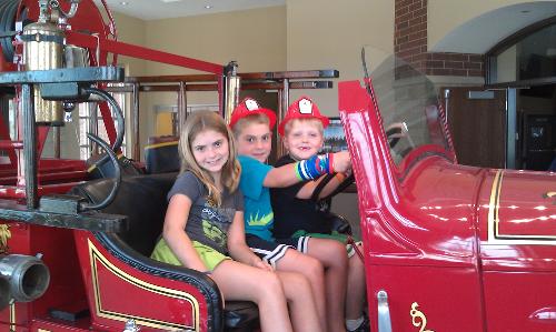 Sitting in the 1930something firetruck.