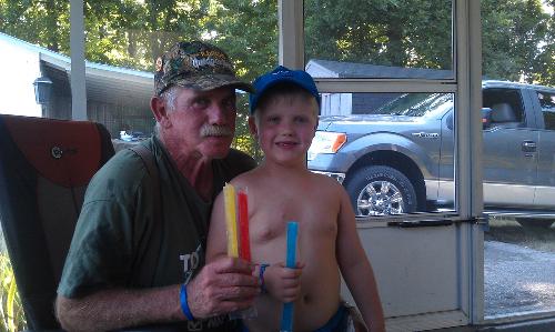 Carson and Papa with freezer pops. Of course we melted Carsons, thickened it and he ate it with a spoon:)