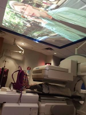 Watching a movie on the ceiling while getting the scans!