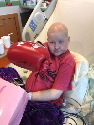 Maya and her new boxing gloves!!  Kicking cancer's a$$!