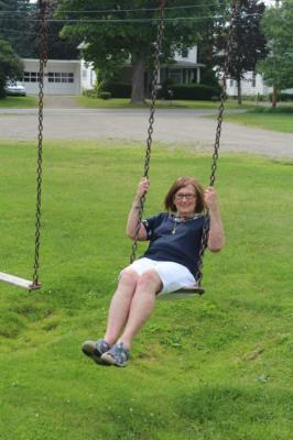 We found these swings at a church in Perkinsville (Steuben County, New York) one day while on a genealogy project; she couldn't resist the playground and the swings.