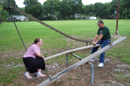 Daddy and I on a seesaw…that was about to break! Lol