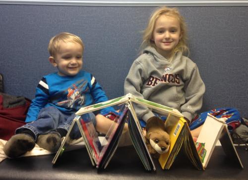 The kids making a house for Campbells otter while we wait at the doctor's office 
