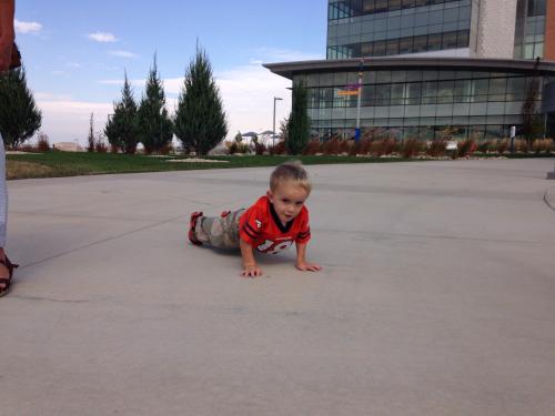 Cooper decided he needed to do some push ups on the way to the car