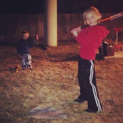Playing baseball, in the dark, because it just feels good to be outside and running around, after being in one room all day!