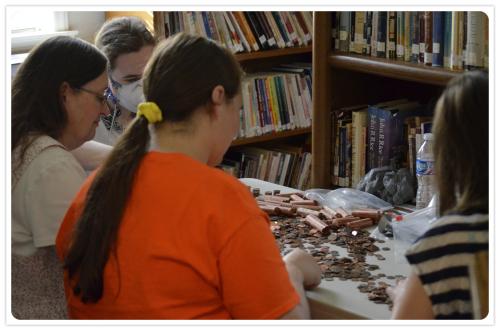 Counting pennies from the VBS penny offering...in the church library :)
