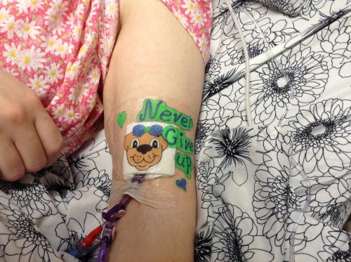 An important message displayed on Pickles the PICC line...never give up {a pic of my decorated PICC line dressing}