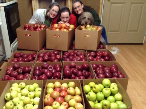 Valerie, me, Keisha, and Ezra behind the many, many boxes of apples...an apple a day keeps the doctor away, right?! ;)  Unfortunately, that doesn't apply to Valerie and I seeing as how we can't eat them.