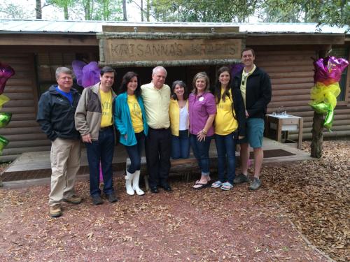 Dedication of Krisanna's Krafts cabin at Camp Grace at the first Yellow Day. Pictured here are Krisanna's camp friends who honor her KERage with this gift:  Chief, Mr. P, Miss Debbie, Miss Melissa (Rap-a-Hope Director Extraordinaire), Miss Melissa (Camp Grace Director), and Mr. Tyler. We know Krisanna and Miss Ruth, Rap-a-Hope Arts and Crafts Director, were clapping and singing from above!