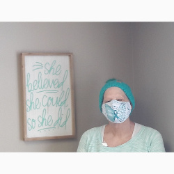 Teal Warrior, Rhonda! The sign behind her was a "thank you" gift she gave  for Dr. Sharma's treatment area. Everyone battling cancer and receiving treatment can be encouraged by those words. 