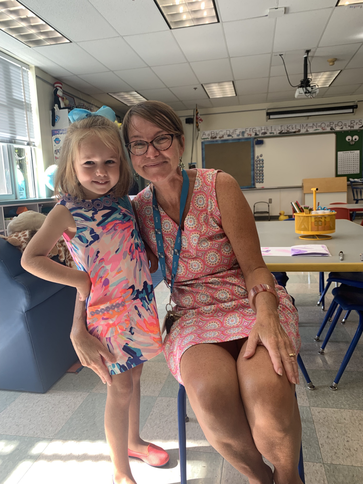 with her Riderwood kindergarten teacher, Mrs. Buchman