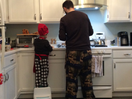 Brad and our son making breakfast