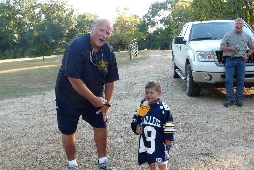 Hayden with the coach of Misissippi College, Coach Teddy Bear!