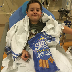 It's always a long thinking process for Broder to decide what he wants to eat after his procedures since he is without food for so long leading up to it.  A few weeks ago, Broder decided he was going to eat Sun Chips after this procedure.  So we came equipped with a full bag, ready to pull it out from out bag when he woke up from the anesthesia, still groggy, but happy.   We were originally told that Broder would not need a bone marrow aspirate at his one year visit, but then his transplant doctor realized Broder had agreed to do a research study that requires it, and we had forgotten all about it.  I had told Broder months before that he would not need to have a bone marrow aspirate done at our next appointment in Philadelphia, so I gave Broder the choice about whether or not to stay in the study and have the procedure.  Broder asked if it would help kids with cancer if he had the bone marrow aspirate, and I said yes, it would.  So he decided he wanted to do it.   