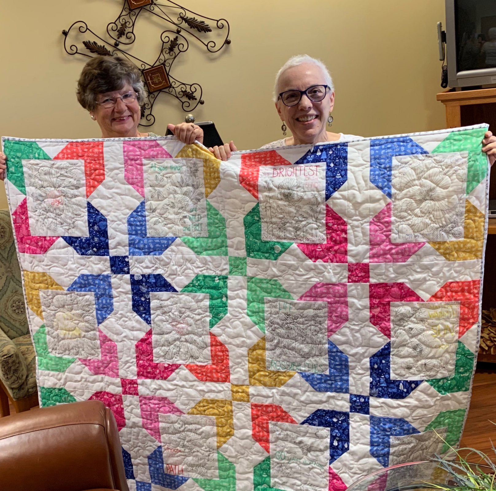 Kenda and me with the quilt she made for me. I love every stitch and I know there are prayers sewn into it. 