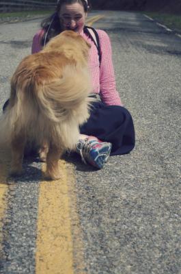 This picture is priceless...sitting in the middle of the road with a hilarious face of surprise, panic, and laughter as a very lively golden retriever rapidly approaches to give me a gigantic doggy kiss.  NOTE: this doggy's name is Trixie...not Indra! ;)  4/15/14
