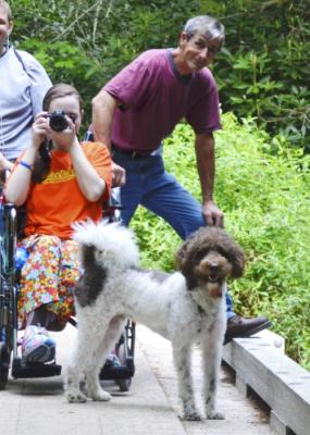 Taking a picture while in a manual wheelchair, my daddy to my left, and Ezra right in front of me...5/28/14 - family vacation 2014