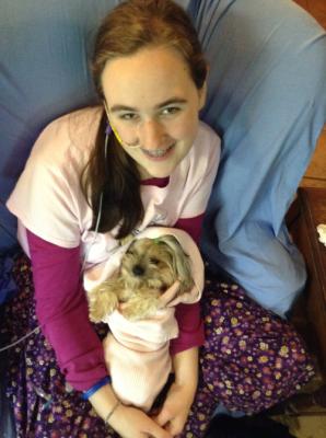 Bella all wrapped up in a blanket snuggling with "Mommy" - family vacation 2014