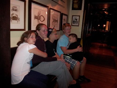 A late night dinner at Fulton's crab house in Downtown Disney. All four grandkids with Vanessa.