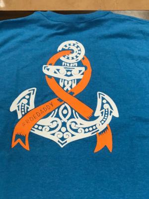 The back of the T-shirt. The orange ribbon represents Leukemia. 