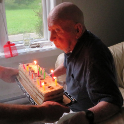 July  26, 2019 - Dad's 97th birthday. Blowing out the candles on his Birthday Tiramisu