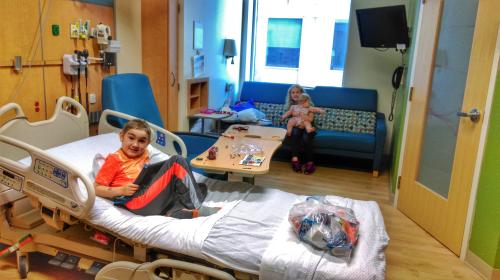 3 kiddos in a hospital room