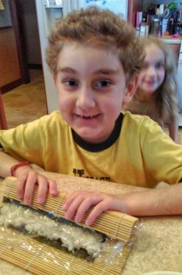 Samuel learning to make sushi