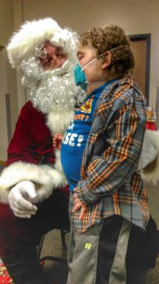 Visiting with Santa at the Richhart Christmas Party