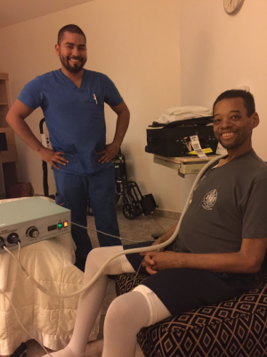 Josh with one of his excellent nurses, Martin. Working on PEMF (Pulsed Electro Magnetic Fields) therapy—helps improve circulation and cell metabolism. 