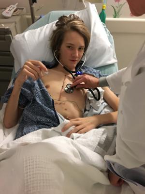 Sam, hearing his new heart for the first time, two weeks post transplant