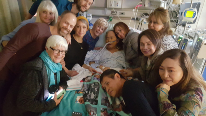 Family&#x20;and&#x20;friends&#x20;gather&#x20;at&#x20;Virgil&#x27;s&#x20;bedside&#x20;midday&#x20;on&#x20;Friday.&#x20;&#x20;Moments&#x20;after&#x20;this&#x20;picture,&#x20;all&#x20;joined&#x20;hands&#x20;with&#x20;Virgil&#x20;and&#x20;prayed&#x20;together&#x20;in&#x20;gratitude&#x20;for&#x20;the&#x20;life&#x20;of&#x20;Virgil&#x20;Ipapo&#x20;and&#x20;his&#x20;gifts&#x20;of&#x20;generosity,&#x20;love,&#x20;and&#x20;care&#x20;for&#x20;friend&#x20;and&#x20;stranger&#x20;alike.&#x20;
